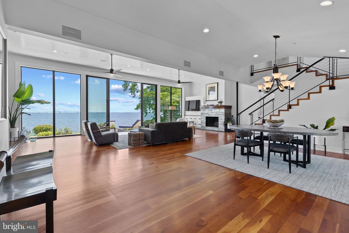 Chandelier, Dining room, Fireplace, Interior, Living room, Pendant Lights, Recessed Lighting, Water, Wood Texture Flooring