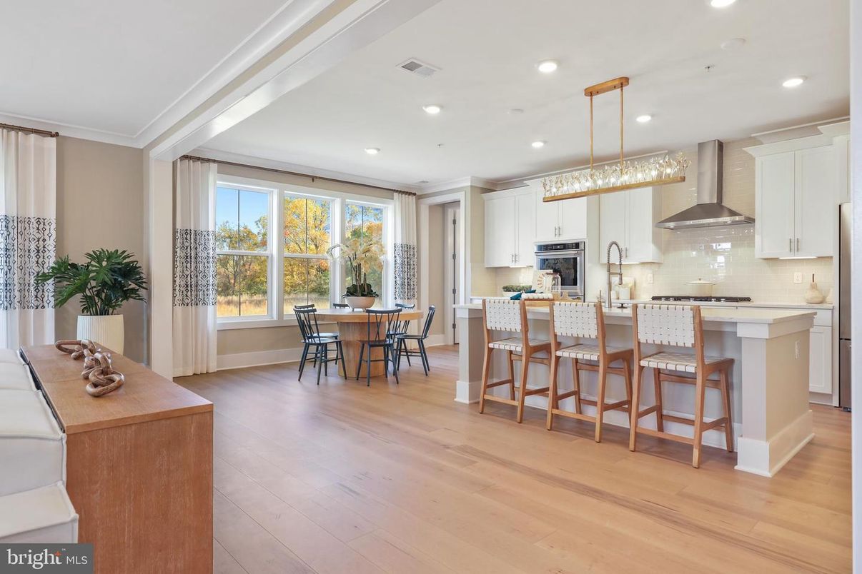 Dining room, Interior, Kitchen, Pendant Lights, Recessed Lighting, Stainless Steel Appliances, Wood Texture Flooring