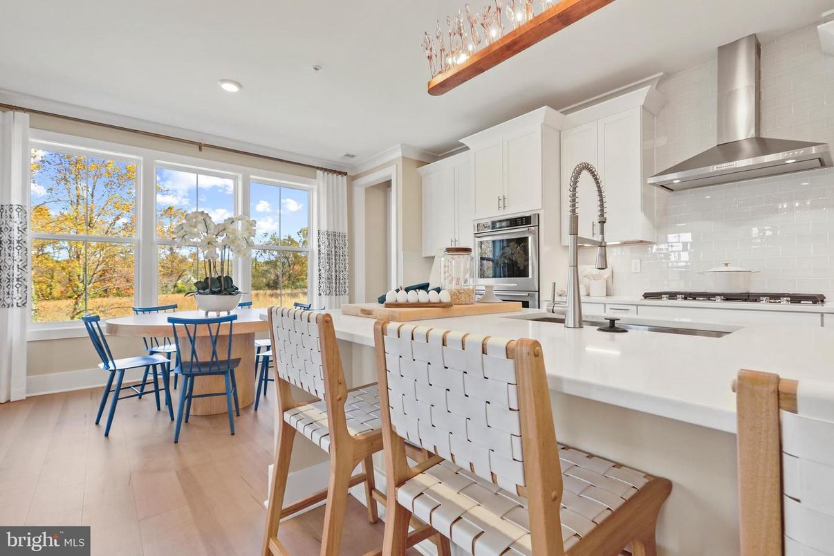 Dining room, Interior, Kitchen, Recessed Lighting, Stainless Steel Appliances, Wood Texture Flooring
