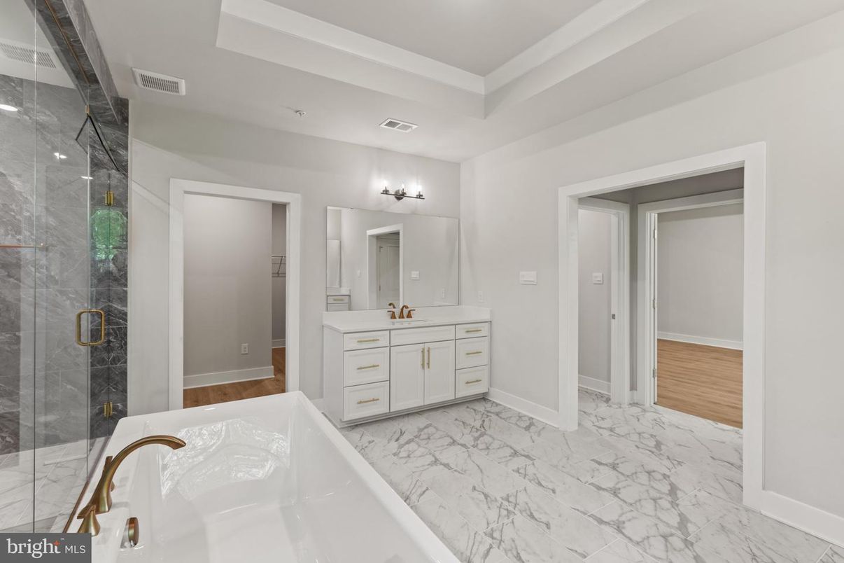 Bathroom, Dual Sink Vanities, Glass Shower, Interior, Marble, Marble Walls