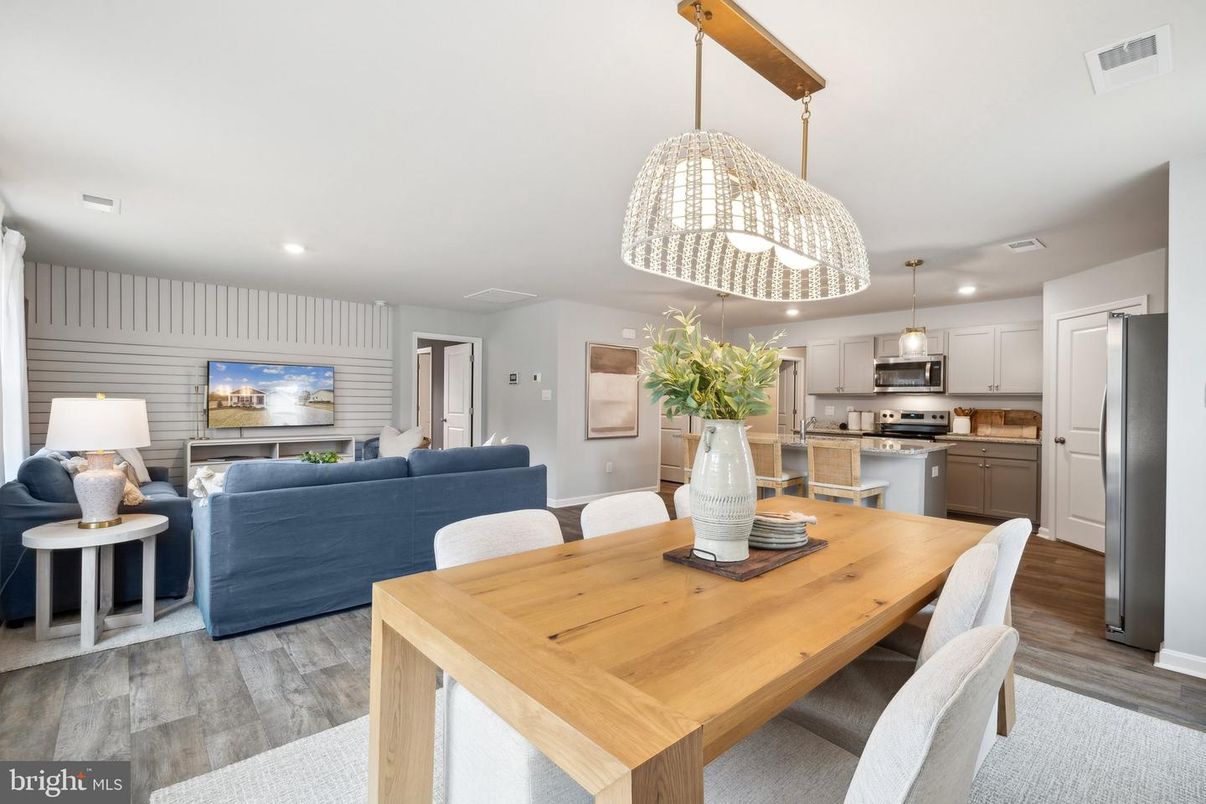 Dining room, Interior, Kitchen, Living room, Pendant Lights, Recessed Lighting, Stainless Steel Appliances, Wood Texture Flooring