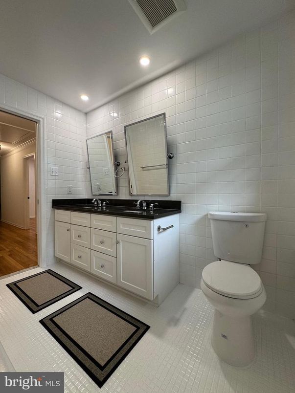 Bathroom, Dual Sink Vanities, Interior, Recessed Lighting, Wood Texture Flooring