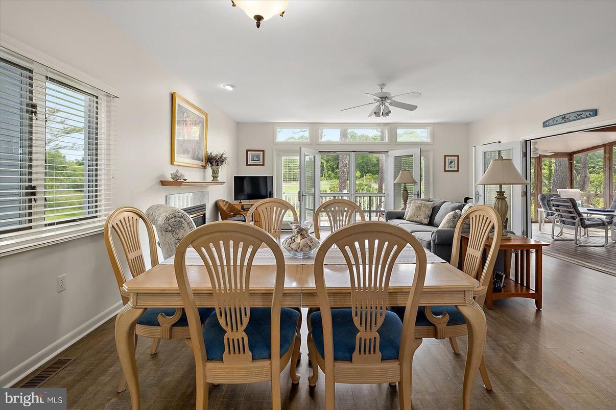 Dining room, Fireplace, Interior, Living room, Recessed Lighting, Wood Texture Flooring