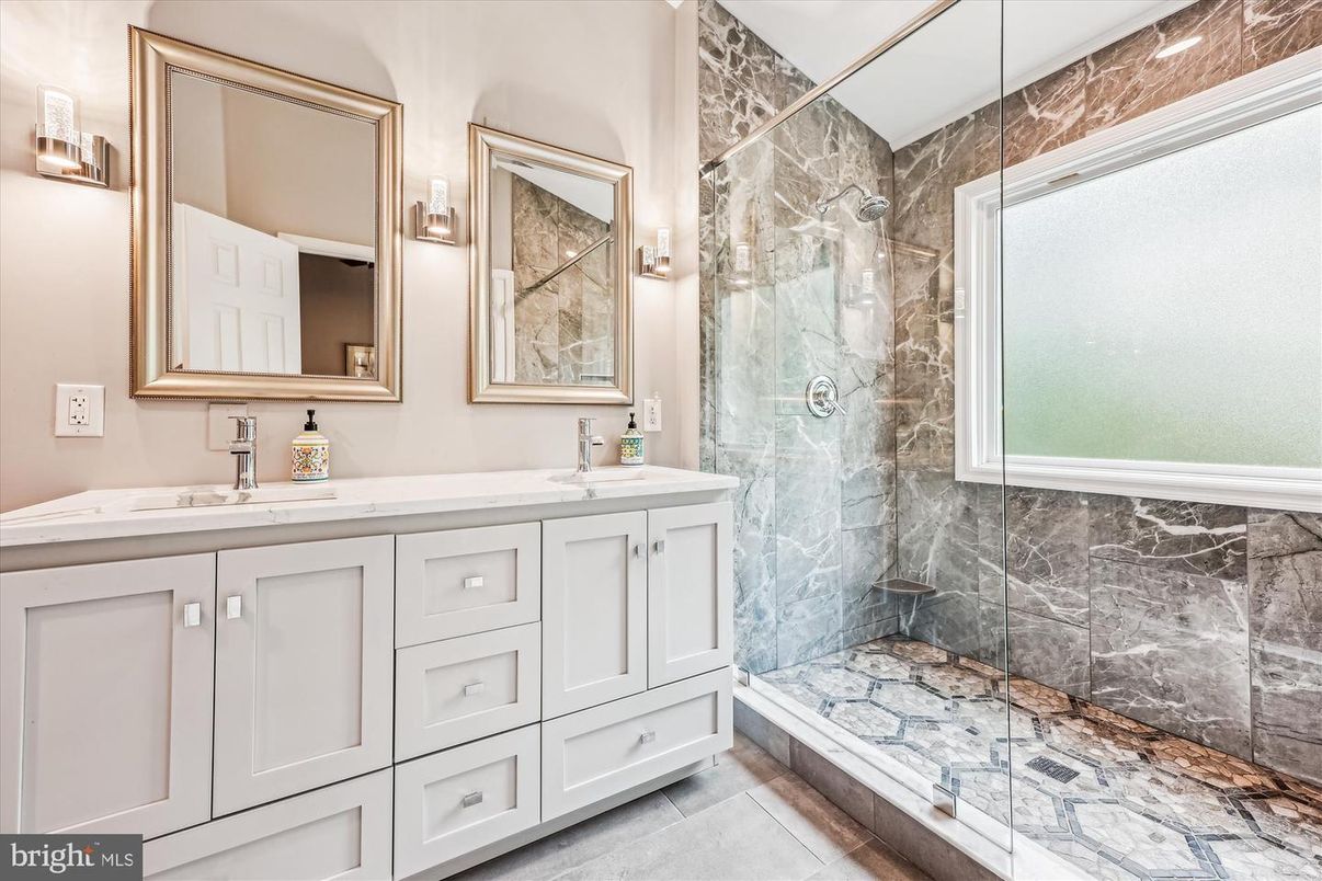 Bathroom, Dual Sink Vanities, Glass Shower, Interior, Marble Walls