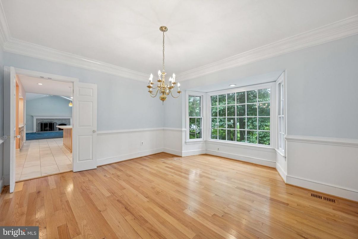 Chandelier, Empty room, Fireplace, Interior, Recessed Lighting, Wood Texture Flooring