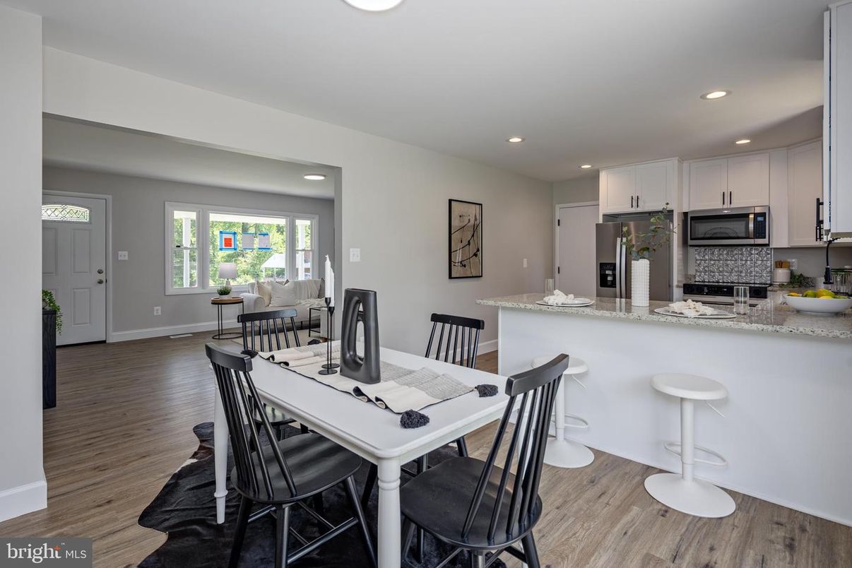 Dining room, Interior, Kitchen, Recessed Lighting, Stainless Steel Appliances, Wood Texture Flooring