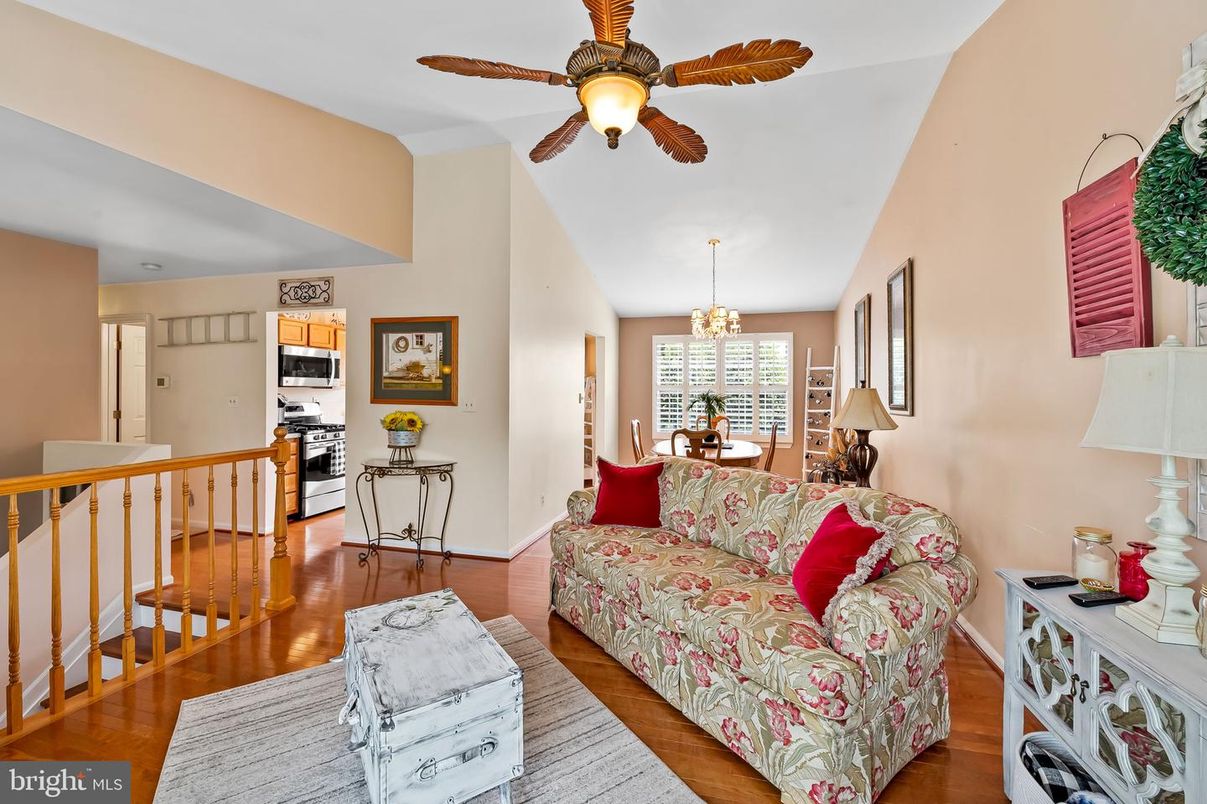 Chandelier, Dining room, Interior, Kitchen, Living room, Stainless Steel Appliances, Wood Texture Flooring