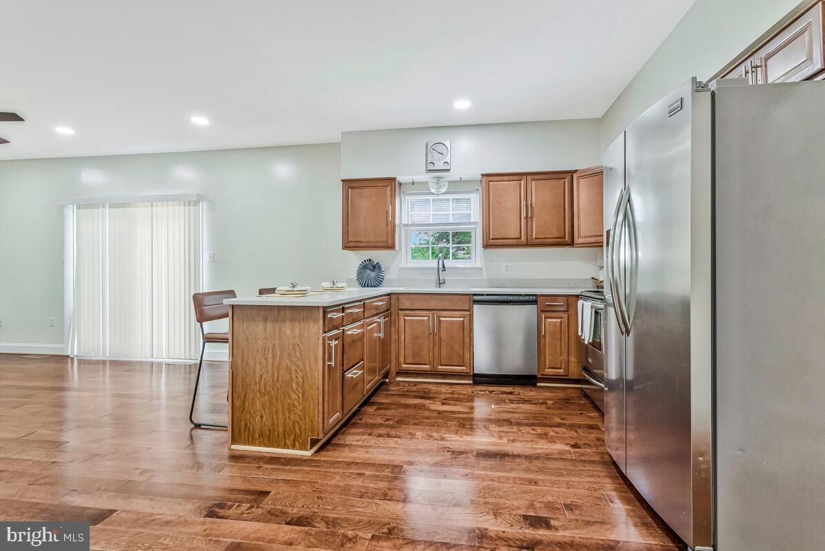 Dining room, Interior, Kitchen, Recessed Lighting, Stainless Steel Appliances, Wood Texture Flooring