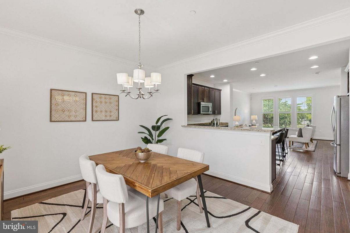 Chandelier, Dining room, Interior, Kitchen, Recessed Lighting, Stainless Steel Appliances, Wood Texture Flooring