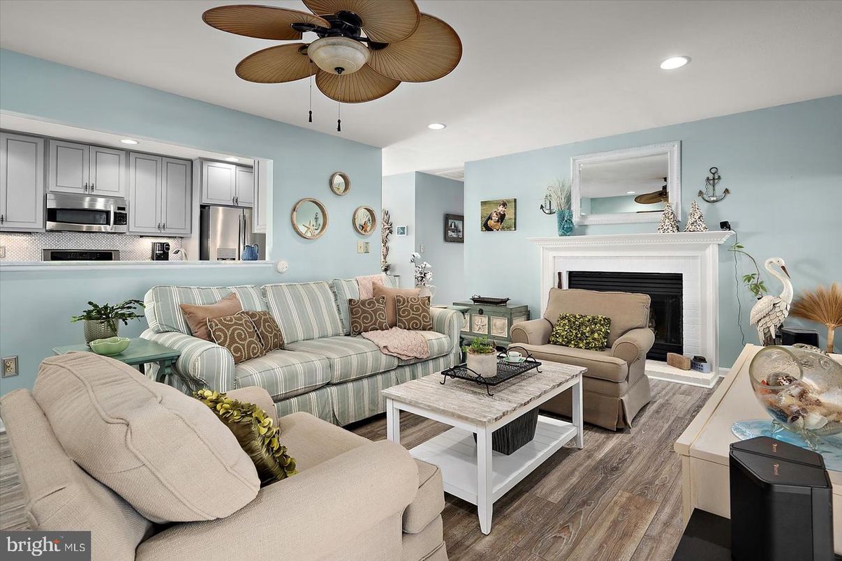 Fireplace, Interior, Kitchen, Living room, Recessed Lighting, Stainless Steel Appliances, Wood Texture Flooring