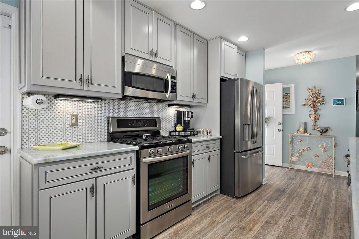 Interior, Kitchen, Recessed Lighting, Stainless Steel Appliances, Wood Texture Flooring