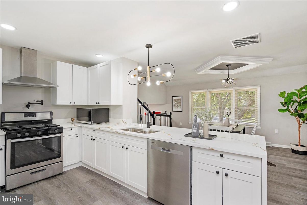 Interior, Kitchen, Pendant Lights, Recessed Lighting, Stainless Steel Appliances, Wood Texture Flooring