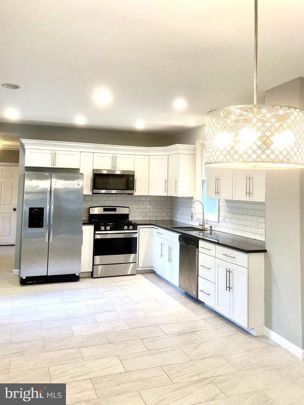 Interior, Kitchen, Marble, Pendant Lights, Recessed Lighting, Stainless Steel Appliances, Wood Texture Flooring
