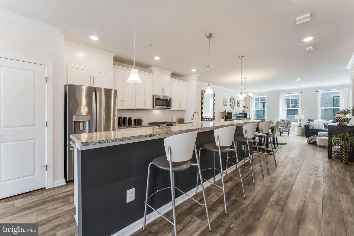 Dining room, Interior, Kitchen, Living room, Pendant Lights, Recessed Lighting, Stainless Steel Appliances, Wood Texture Flooring