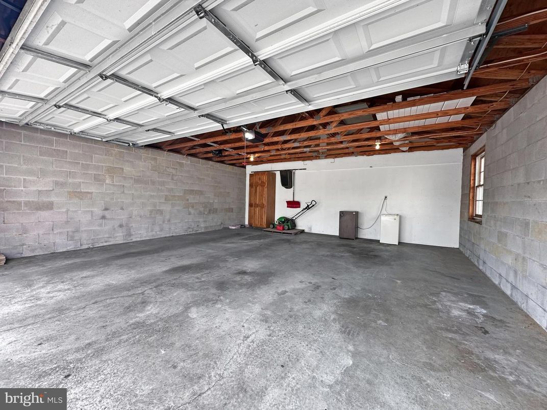 Garage, Interior, Stone Walls, Wooden Beams
