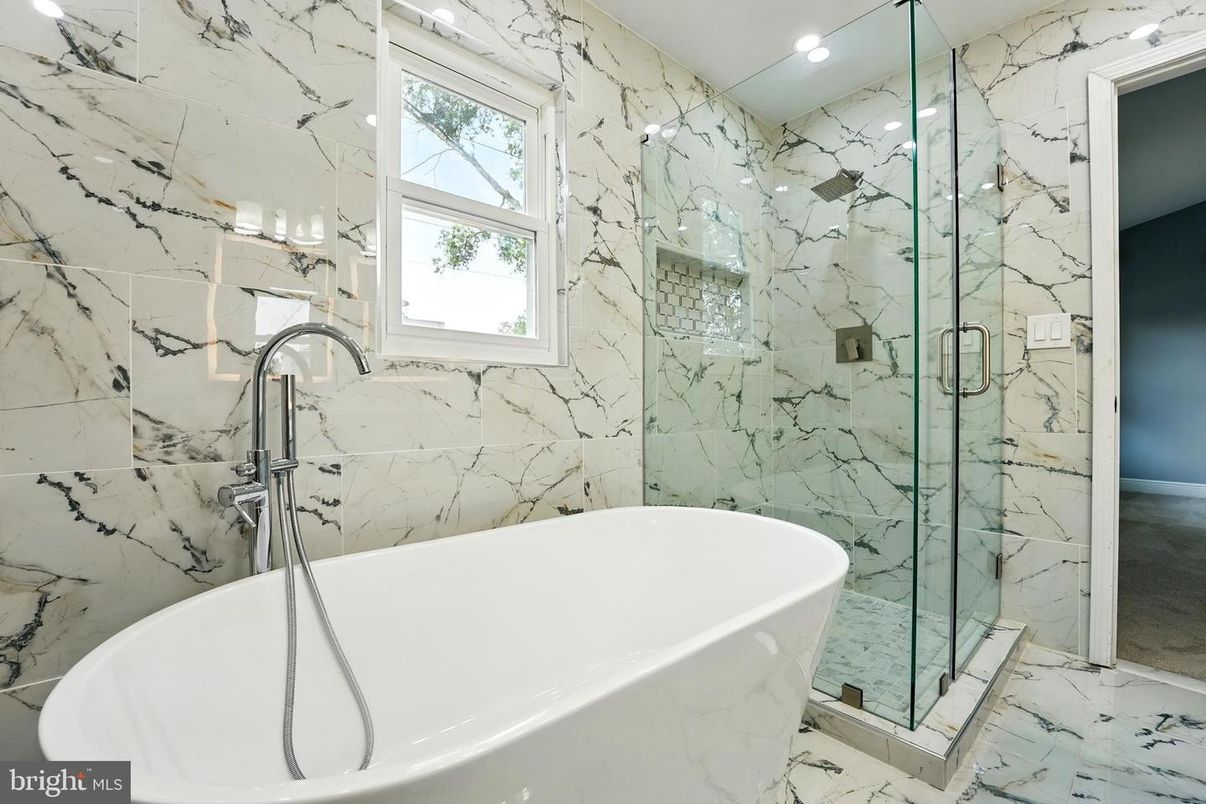 Bathroom, Free Standing Baths, Glass Shower, Interior, Marble, Marble Walls, Recessed Lighting