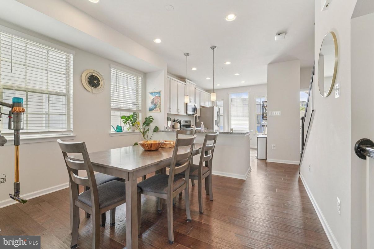 Dining room, Interior, Kitchen, Pendant Lights, Recessed Lighting, Stainless Steel Appliances, Wood Texture Flooring