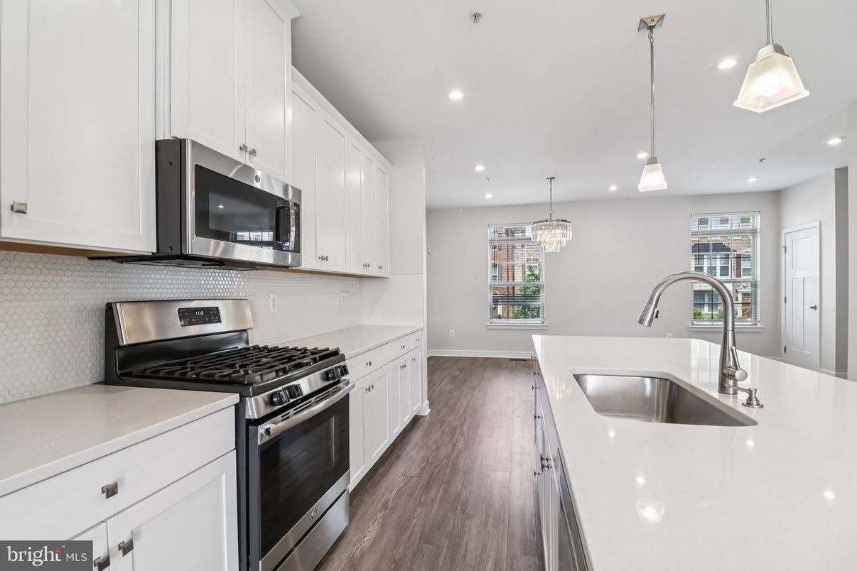 Chandelier, Interior, Kitchen, Pendant Lights, Recessed Lighting, Stainless Steel Appliances, Wood Texture Flooring