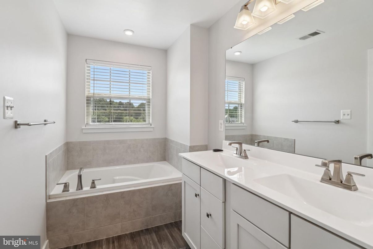 Bathroom, Dual Sink Vanities, Interior, Recessed Lighting, Wood Texture Flooring