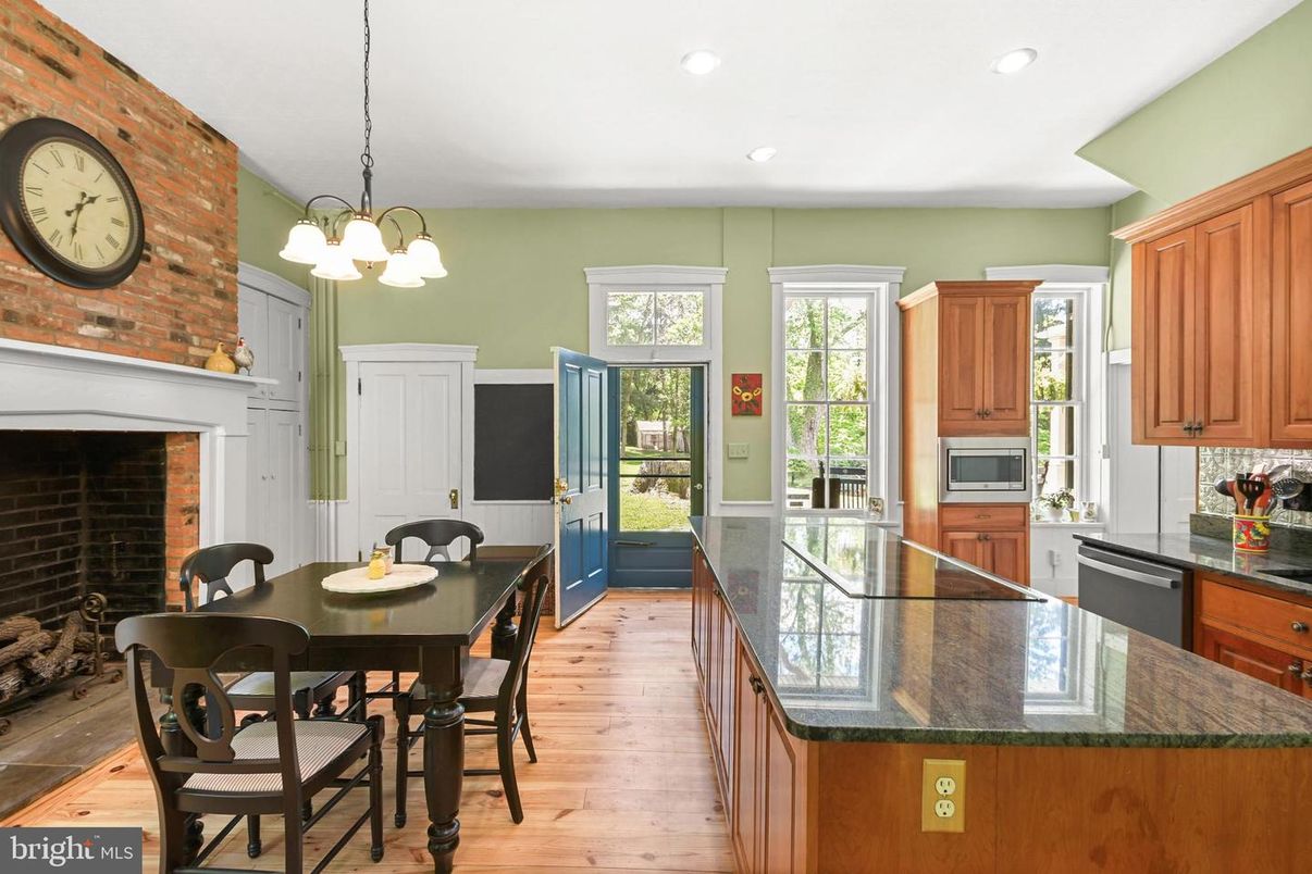 Dining room, Fireplace, Interior, Kitchen, Pendant Lights, Recessed Lighting, Stone Walls, Wood Texture Flooring