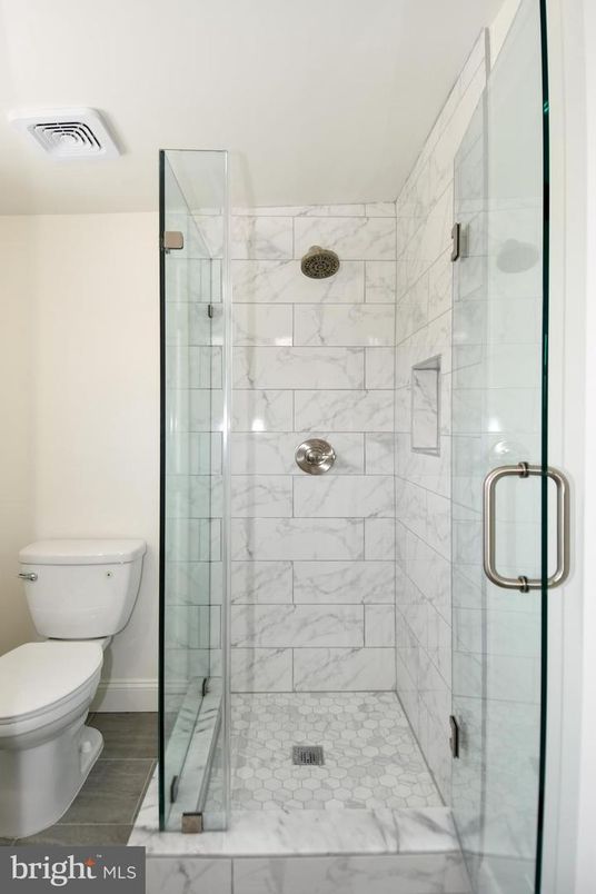 Bathroom, Glass Shower, Interior, Marble Walls, Wood Texture Flooring