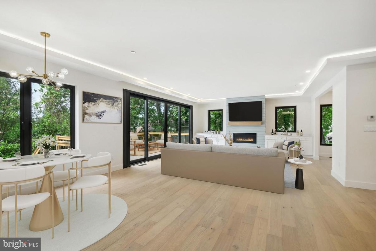 Dining room, Fireplace, Interior, Living room, Pendant Lights, Recessed Lighting, Wood Texture Flooring