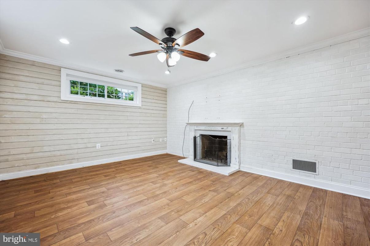 Empty room, Fireplace, Interior, Recessed Lighting, Wood Texture Flooring