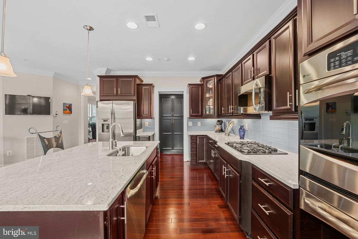 Interior, Kitchen, Pendant Lights, Recessed Lighting, Stainless Steel Appliances, Wood Texture Flooring