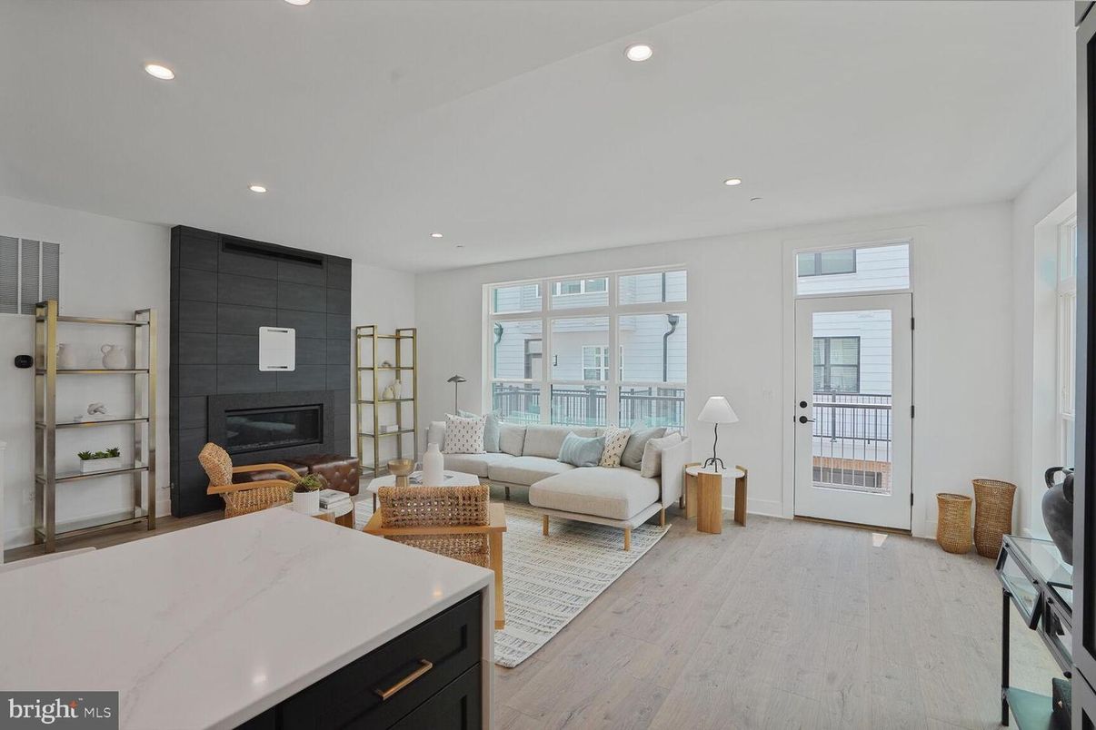 Fireplace, Interior, Living room, Recessed Lighting, Water, Wood Texture Flooring