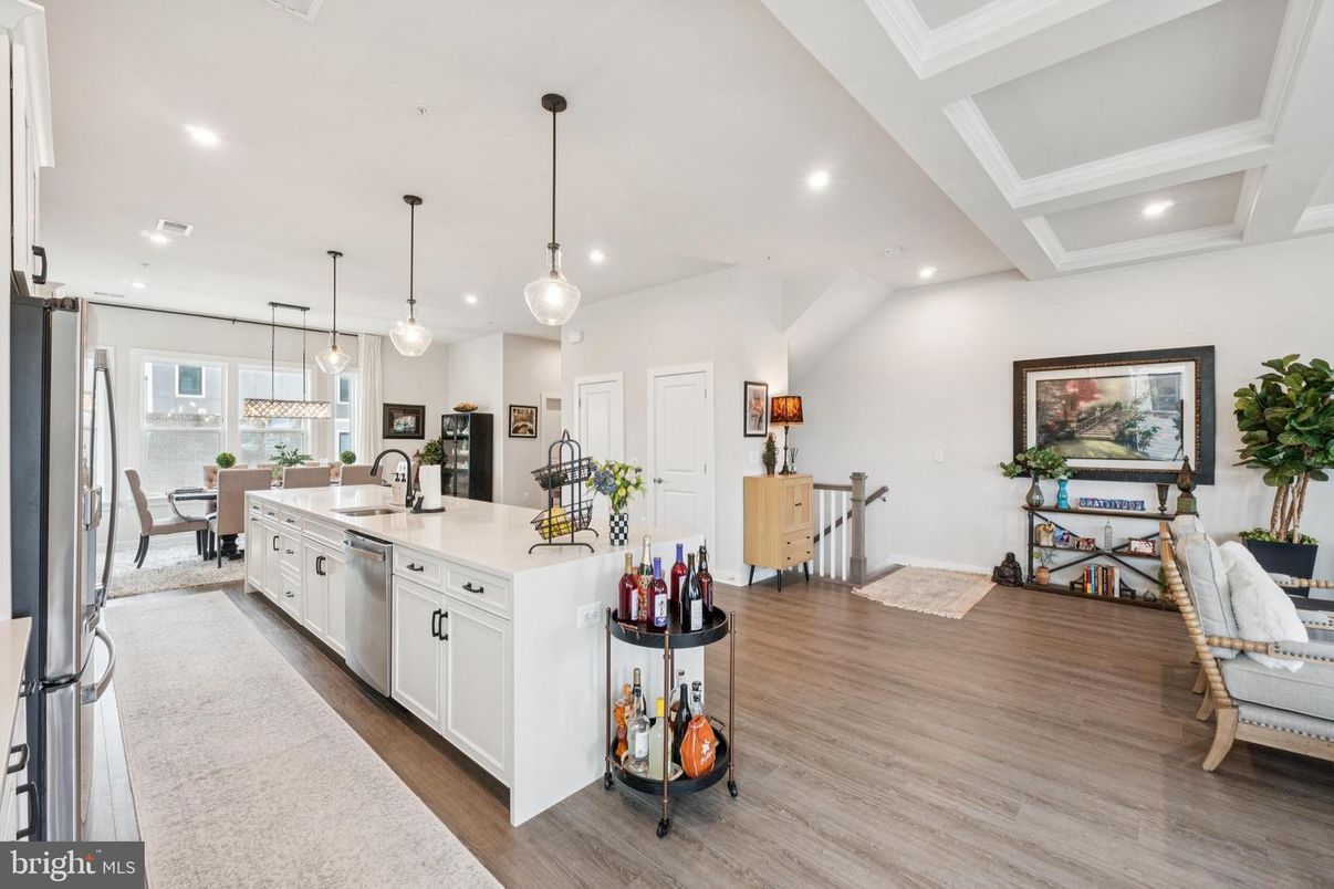 Dining room, Interior, Kitchen, Pendant Lights, Recessed Lighting, Stainless Steel Appliances, Wood Texture Flooring