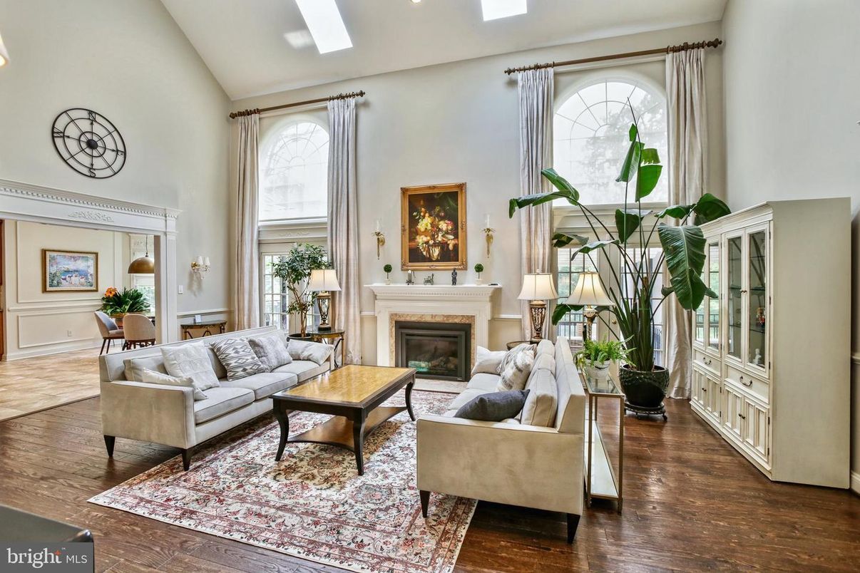 Dining room, Fireplace, Interior, Living room, Recessed Lighting, Wood Texture Flooring