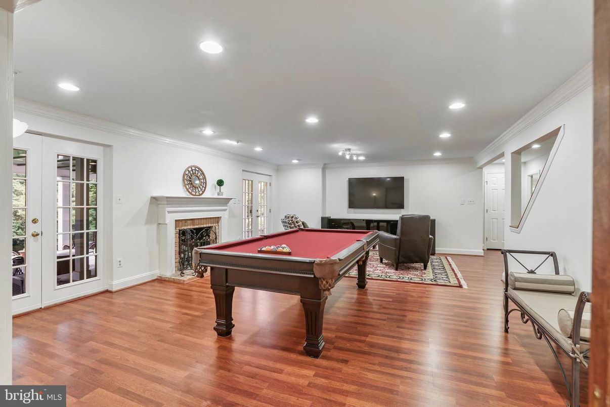 Billiard Table, Fireplace, Game Room, Interior, Recessed Lighting, Wood Texture Flooring