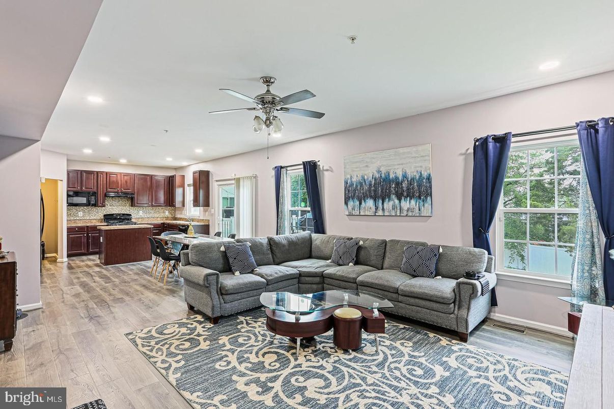 Dining room, Interior, Kitchen, Living room, Recessed Lighting, Stainless Steel Appliances, Wood Texture Flooring