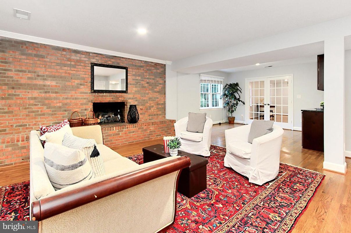Fireplace, Interior, Living room, Recessed Lighting, Stone Walls, Wood Texture Flooring