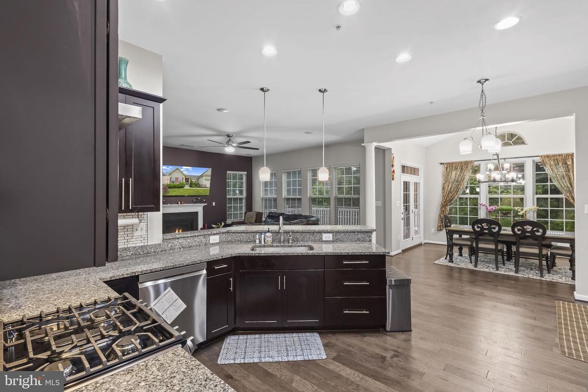 Dining room, Fireplace, Interior, Kitchen, Pendant Lights, Recessed Lighting, Wood Texture Flooring