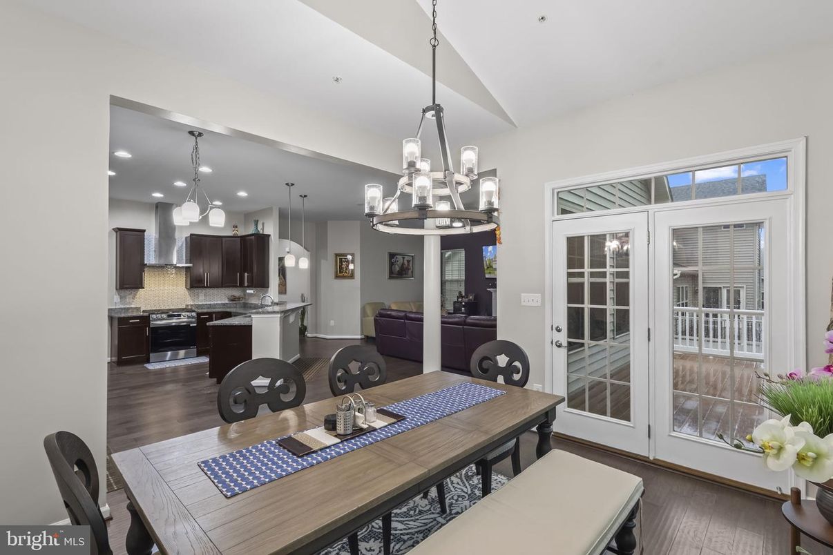 Chandelier, Dining room, Interior, Kitchen, Pendant Lights, Recessed Lighting, Stainless Steel Appliances, Wood Texture Flooring