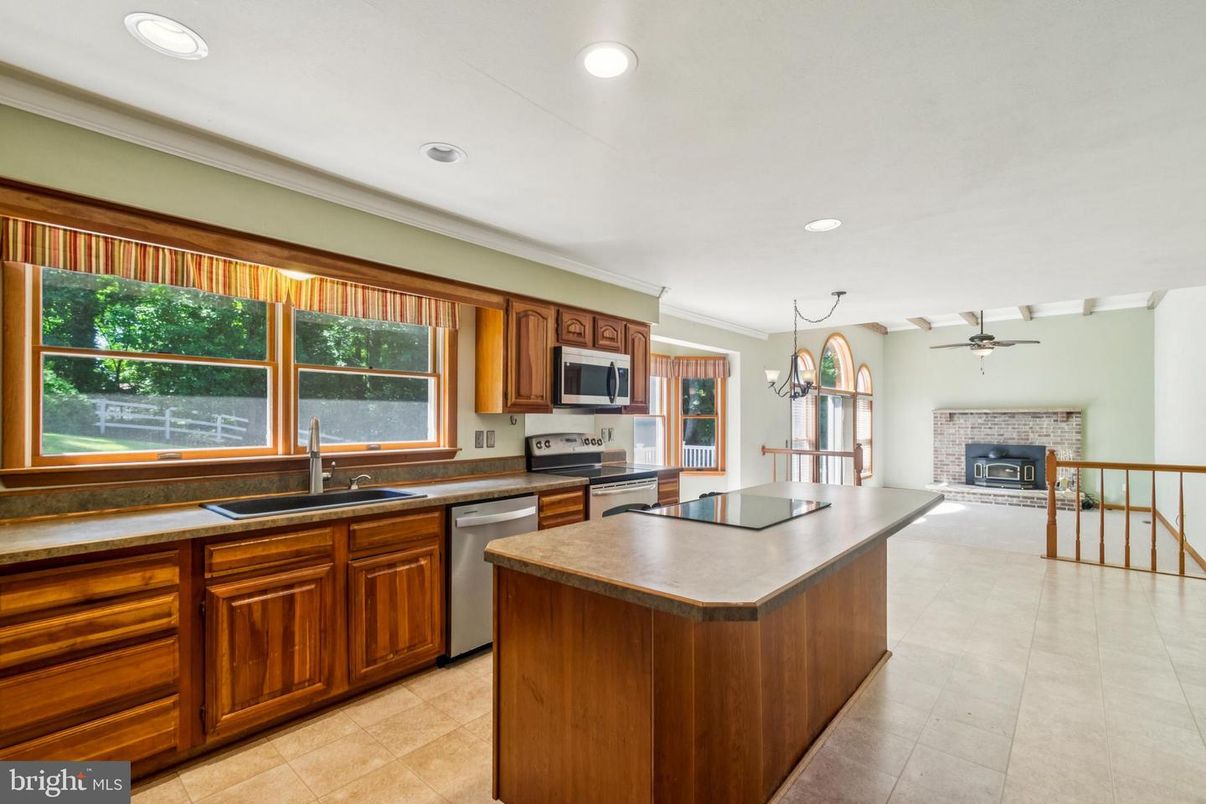 Fireplace, Interior, Kitchen, Recessed Lighting, Stainless Steel Appliances