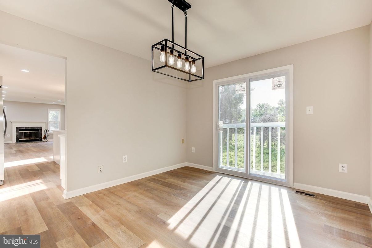 Empty room, Fireplace, Interior, Pendant Lights, Recessed Lighting, Wood Texture Flooring