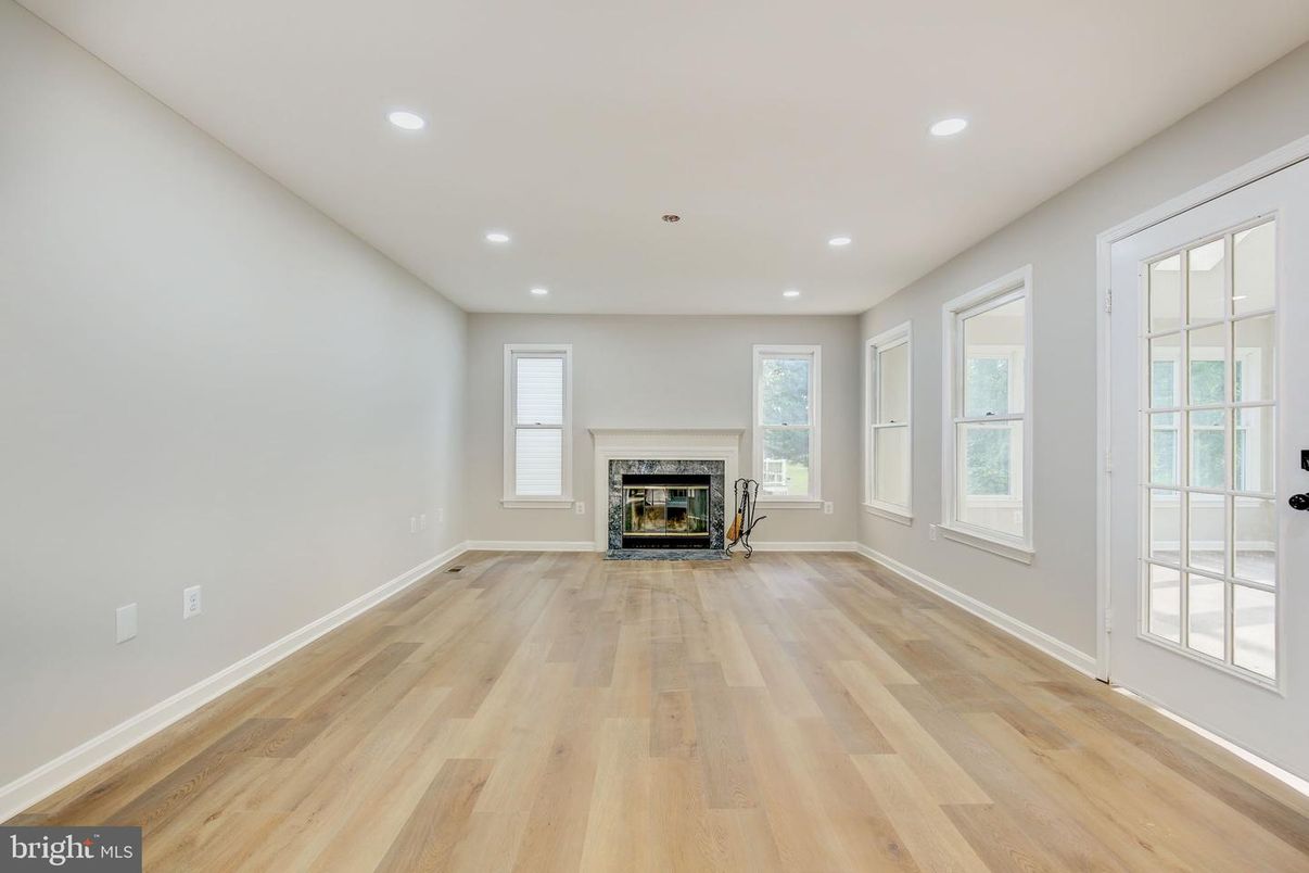 Empty room, Fireplace, Interior, Recessed Lighting, Wood Texture Flooring