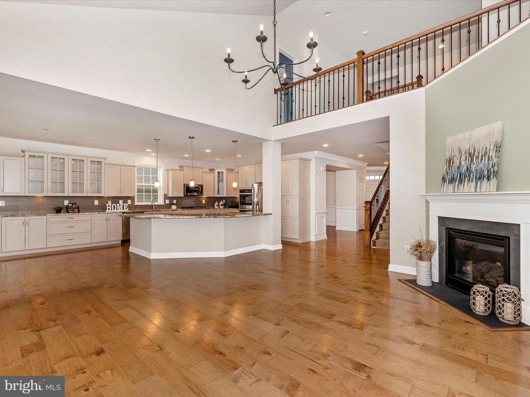Chandelier, Fireplace, Interior, Kitchen, Pendant Lights, Recessed Lighting, Wood Texture Flooring