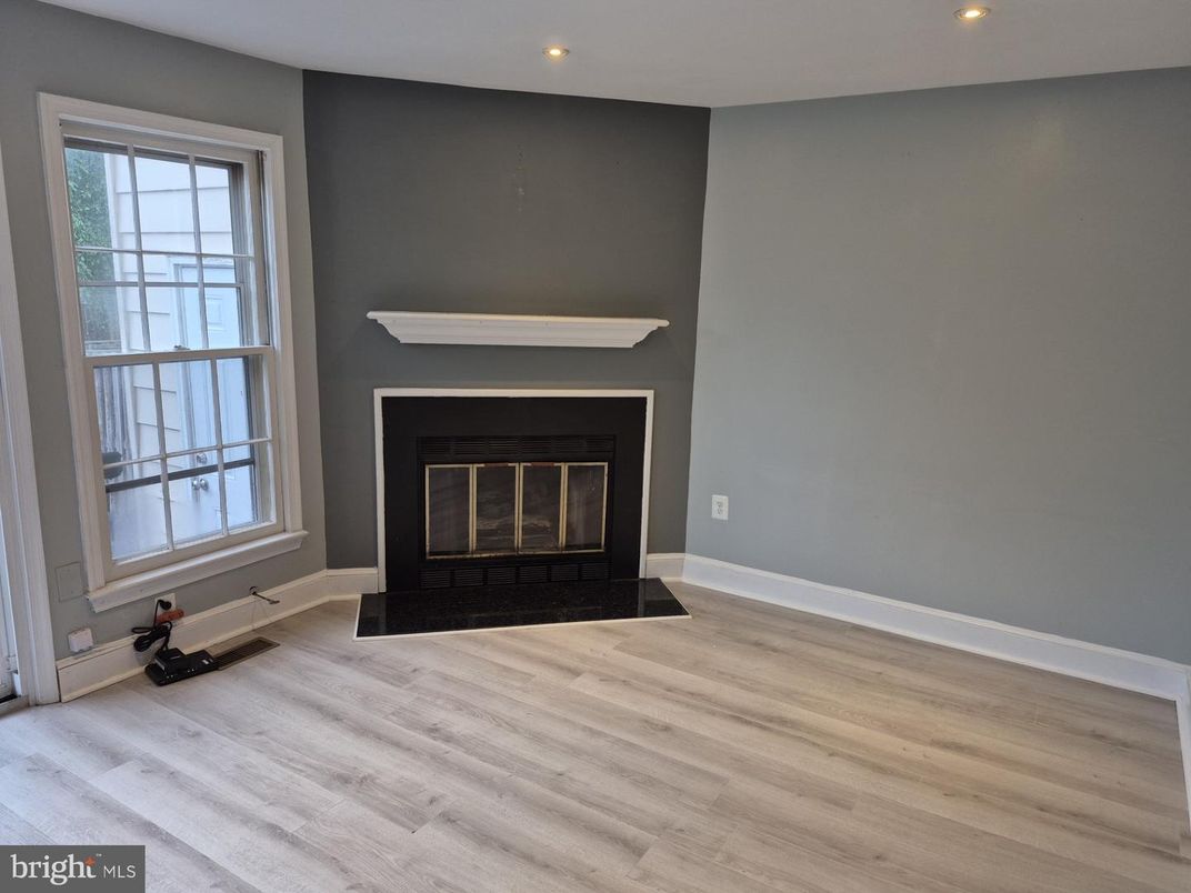 Empty room, Fireplace, Interior, Recessed Lighting, Wood Texture Flooring