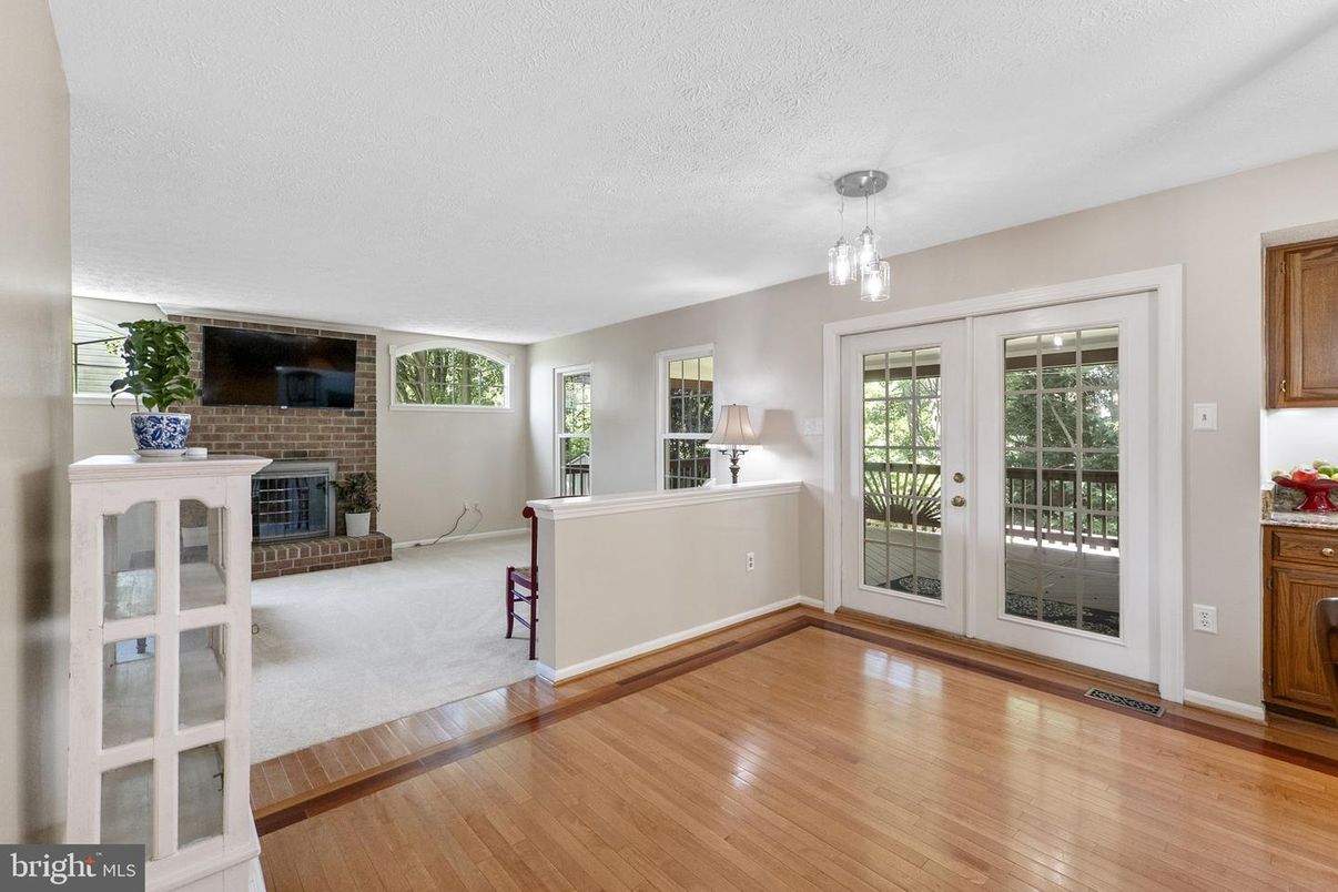 Empty room, Fireplace, Interior, Pendant Lights, Wood Texture Flooring