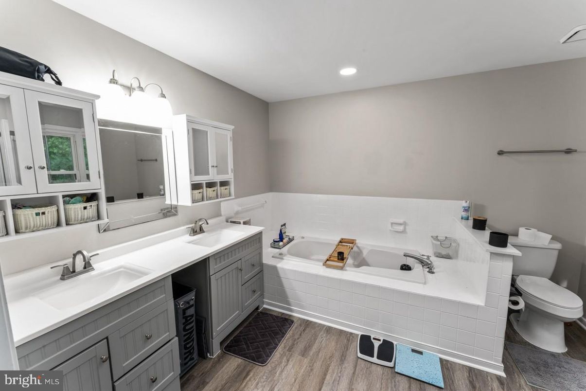 Bathroom, Dual Sink Vanities, Interior, Recessed Lighting, Wood Texture Flooring