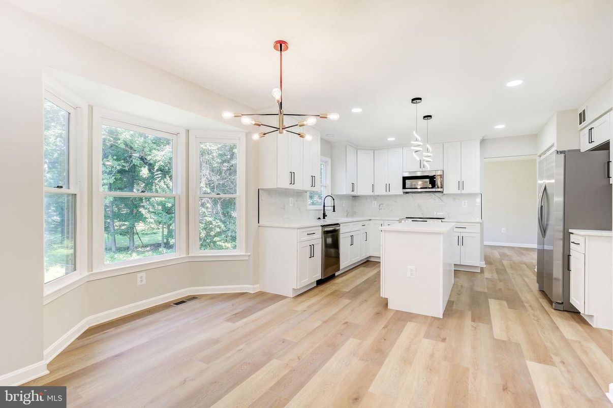 Interior, Kitchen, Marble Walls, Pendant Lights, Recessed Lighting, Wood Texture Flooring