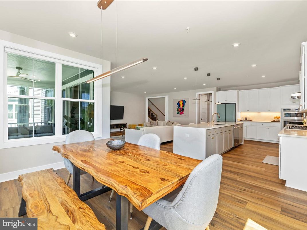 Dining room, Interior, Kitchen, Pendant Lights, Recessed Lighting, Stainless Steel Appliances, Wood Texture Flooring