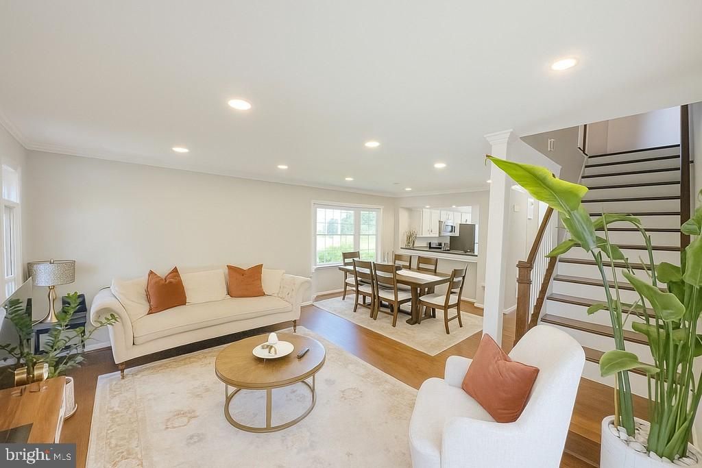 Dining room, Interior, Kitchen, Living room, Recessed Lighting, Stainless Steel Appliances, Wood Texture Flooring