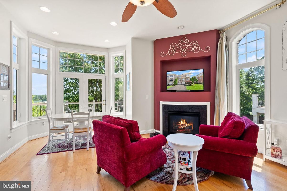Dining room, Fireplace, Interior, Living room, Recessed Lighting, Wood Texture Flooring