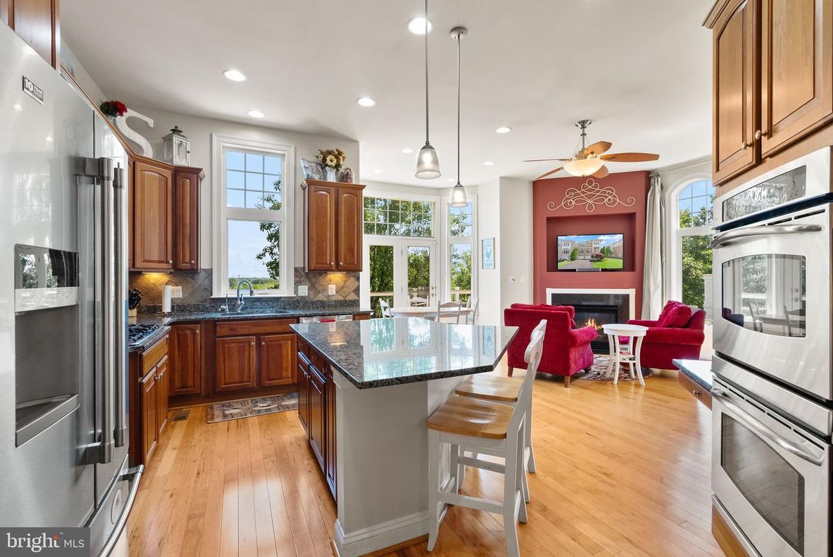 Dining room, Fireplace, Interior, Kitchen, Living room, Pendant Lights, Recessed Lighting, Wood Texture Flooring