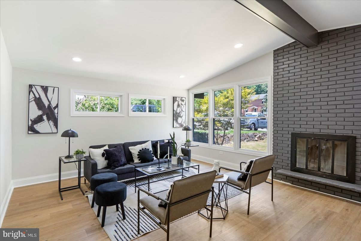 Fireplace, Interior, Living room, Recessed Lighting, Stone Walls, Wood Texture Flooring