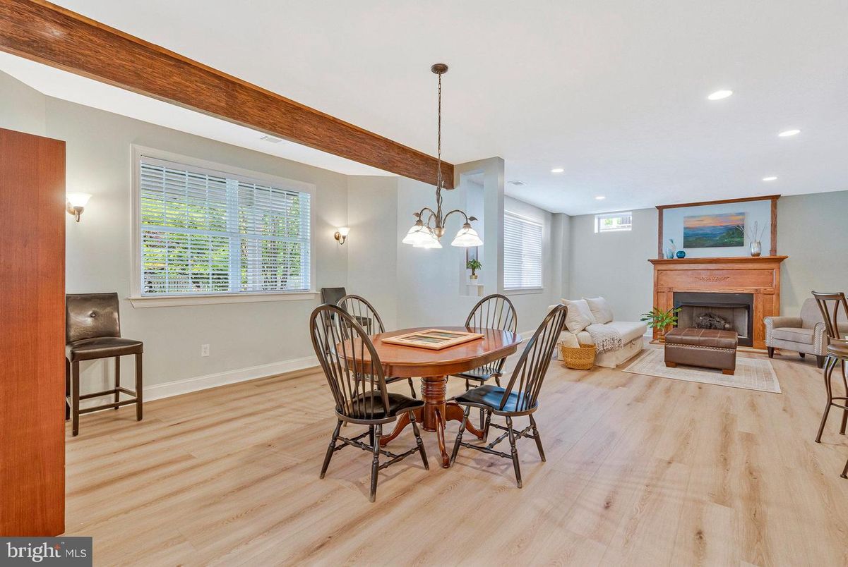Dining room, Fireplace, Interior, Living room, Pendant Lights, Recessed Lighting, Wood Texture Flooring